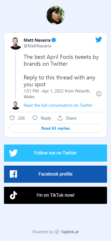 Tweet widget and Twitter, Facebook, TikTok links added as buttons on a Taplink page