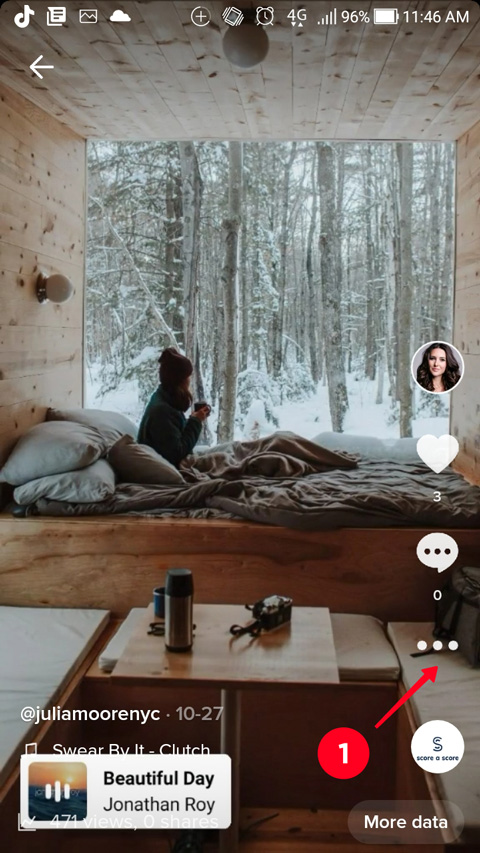 Tapping the three dot menu in the TikTok feed