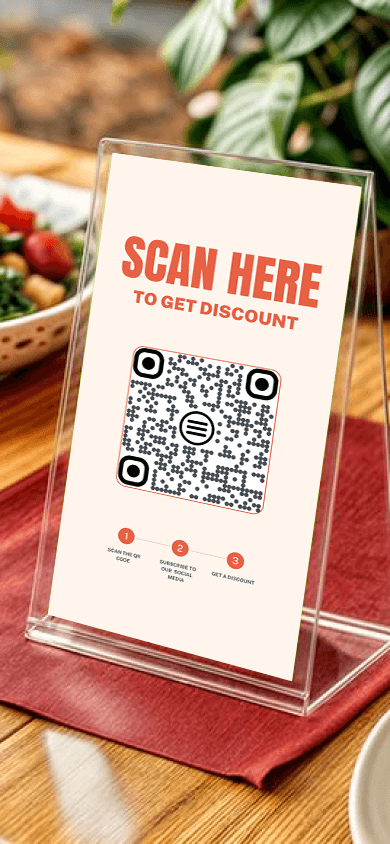 Stand on the desk featuring text and a QR code to get a discount
