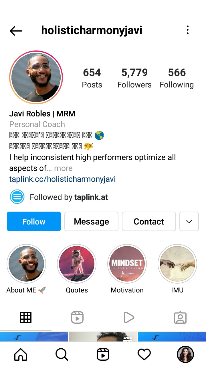 User’s page with a photo of a smiling person set as the Instagram profile picture