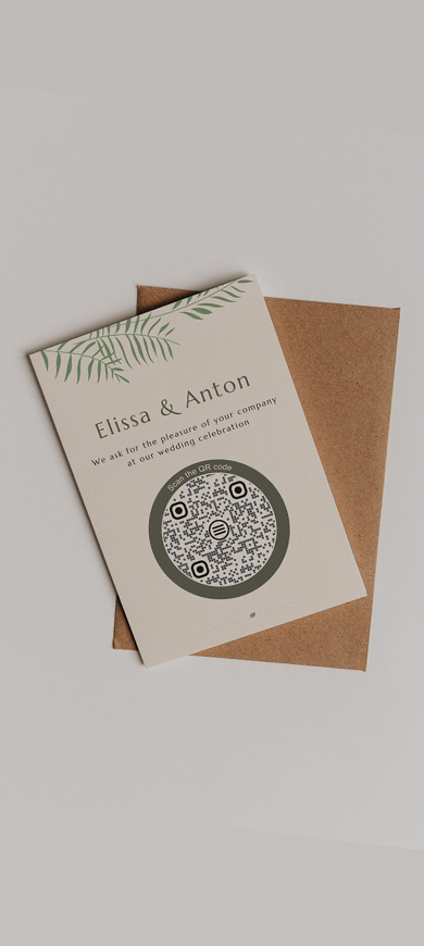 Wedding invitation with a printed QR code directing to a wedding website