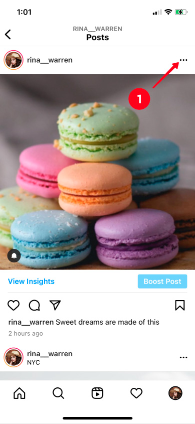 Tapping the three dot icon in the Instagram post in the feed