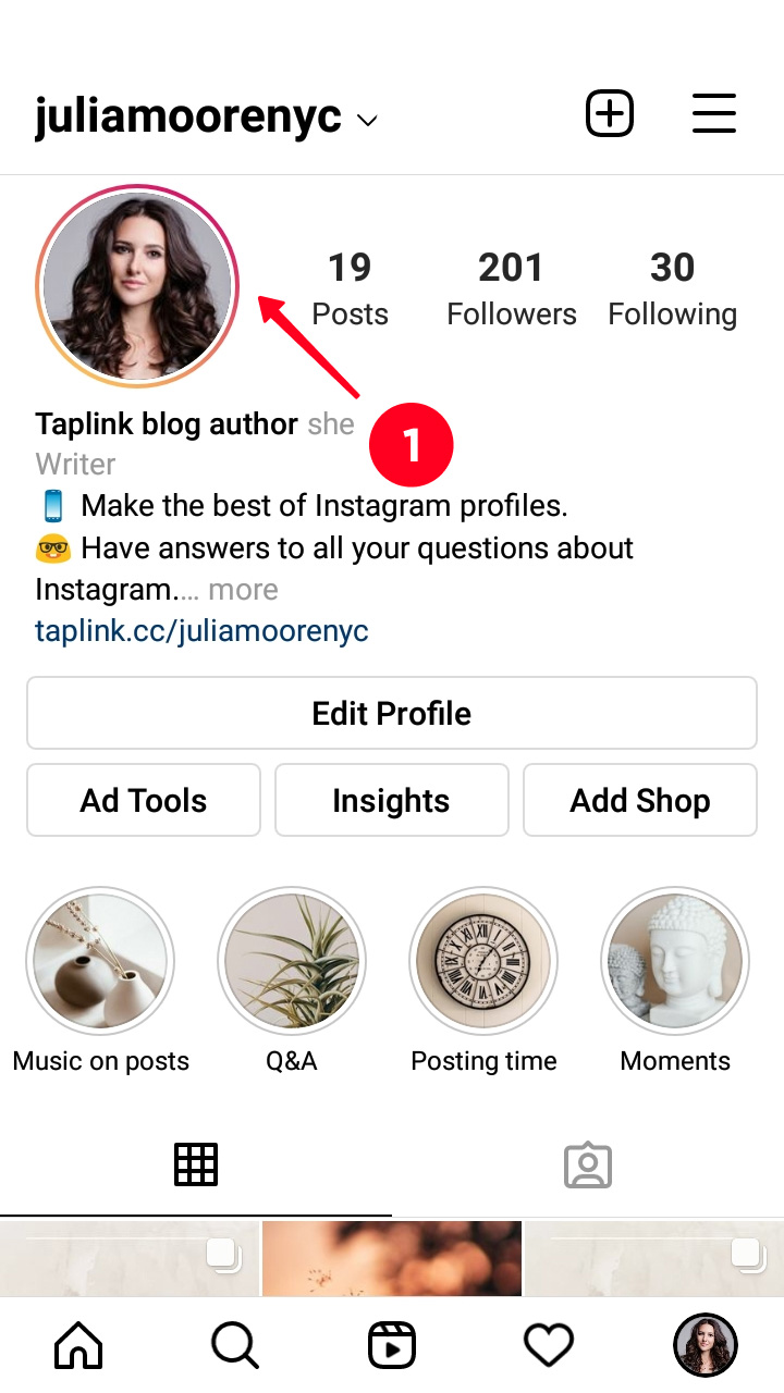 Tapping the profile photo in the Instagram app on a smartphone