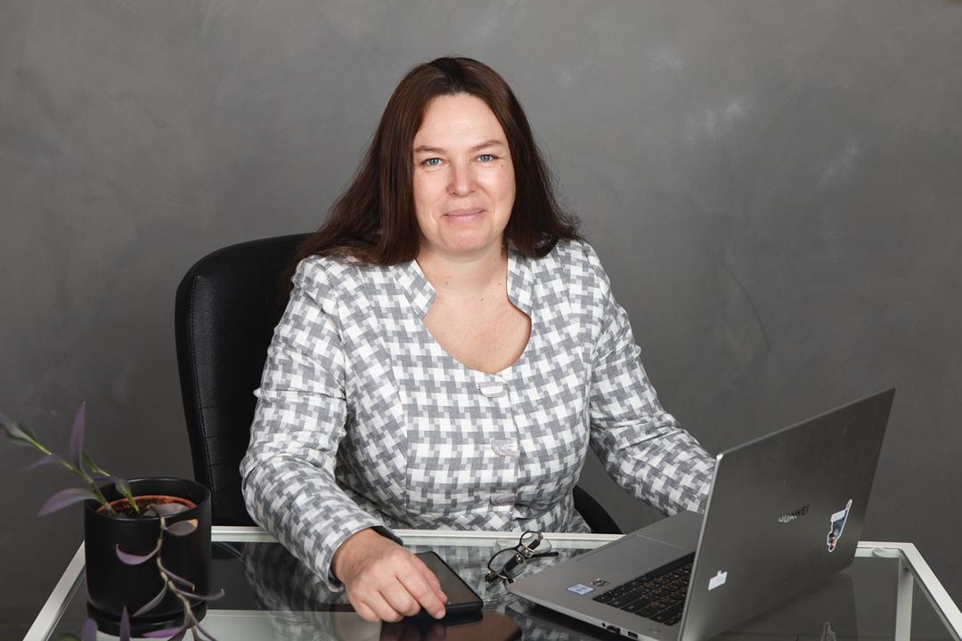 Ksenia Zybkovets at her desk